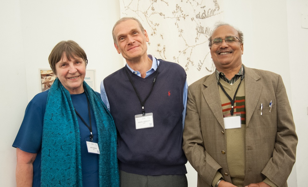 Dr. Upadhyaya, Jean Harris and Daniel Debouck posing for photo. 